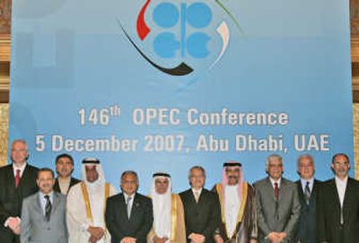 
OPEC oil and energy ministers pose during a photo session Wednesday before the start the closing session of 146th OPEC conference in Abu Dhabi.Associated Press
 (File Assocaited Press / The Spokesman-Review)