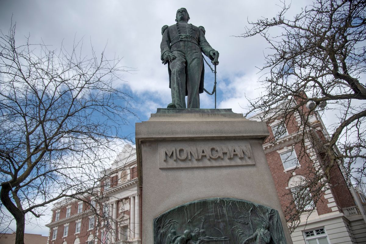 The memorial statue of John Monaghan sits at Monroe Street and Riverside Avenue in downtown Spokane. The son of one of Spokane