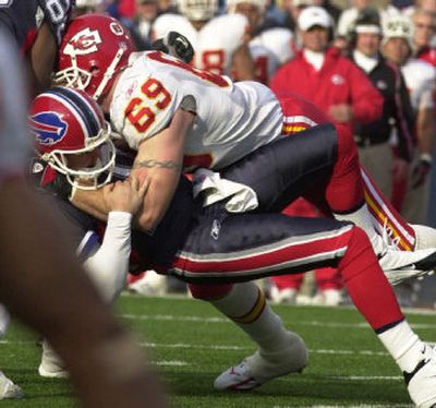 
This sack of Kelly Holcomb by Chiefs' Jared Allen resulted in a concussion that has cost the QB a start this Sunday. 
 (Associated Press / The Spokesman-Review)
