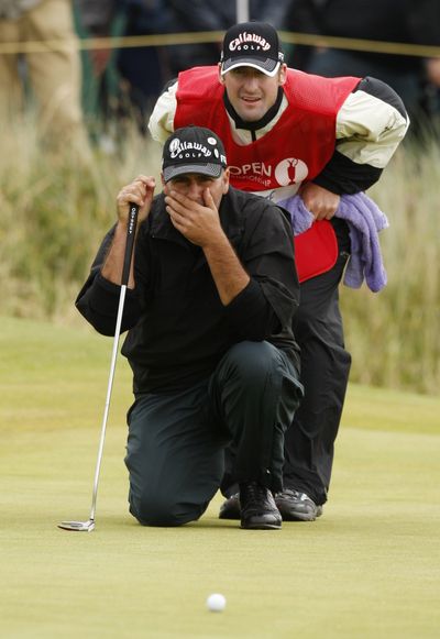 British Open  co-leader Rocco Mediate lines up a putt on the eighth green.  (Associated Press / The Spokesman-Review)