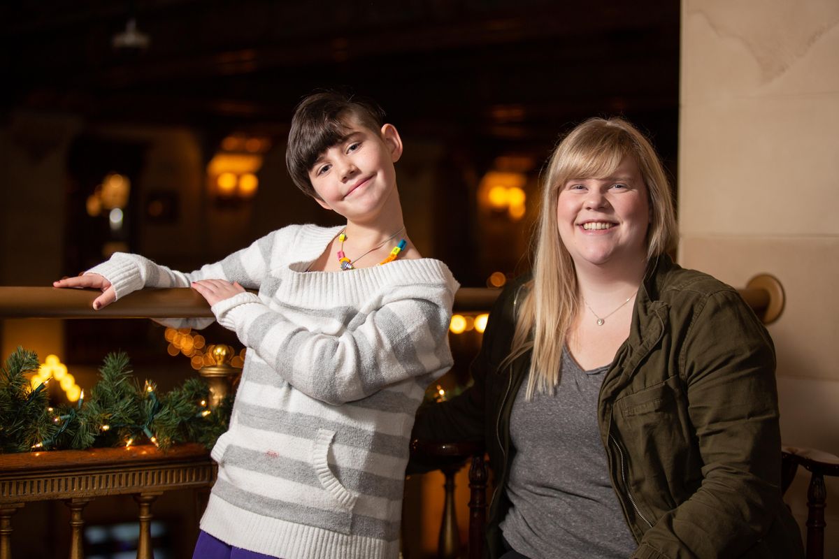 Youth honoree Gracie Coates and adult honoree Amber Fisher pose for a portrait at the Historic Davenport Hotel on Nov. 21, 2018. The pair are honorees for this year's Inland Northwest Jingle Bell Run on Dec.1, which benefits the Arthritis Foundation. (Libby Kamrowski / The Spokesman-Review)
