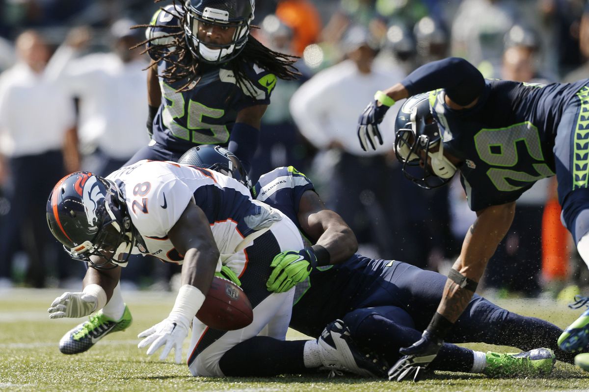The Legion of Boom’s Richard Sherman (25), Earl Thomas (29) and Kam Chancellor, making tackle, are 3 of 5 Seattle Seahawks who were selected to the Pro Bowl. (Associated Press)