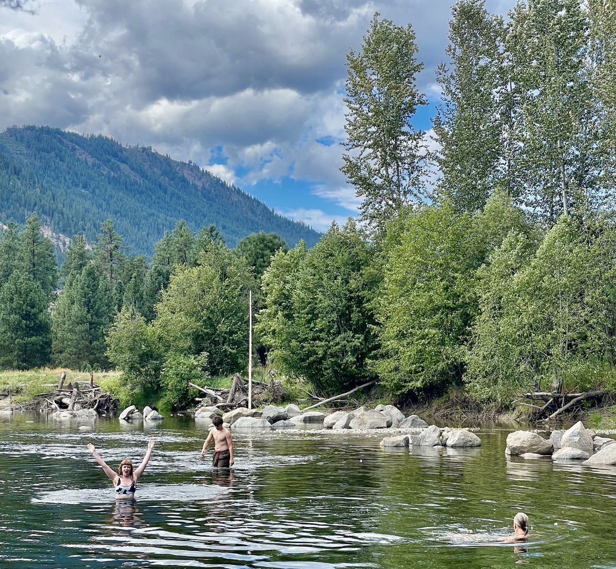 Swimming in the Icicle River during a family reunion party.