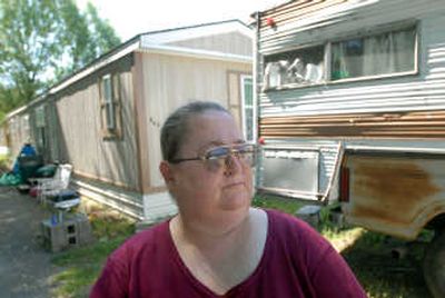 
Amy Horton stands in front of her mobile home in Rathdrum, but she spent more than a year living in a camper at area RV parks. She is taking part in community discussions about poverty in the region.
 (Jesse Tinsley / The Spokesman-Review)