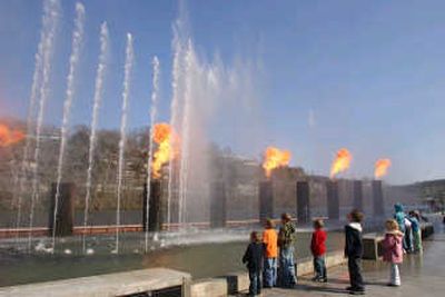
McClatchy Tribune The new Branson Landing development has upscale shops and a fire-and-water feature that keeps the kids entertained.
 (McClatchy Tribune / The Spokesman-Review)