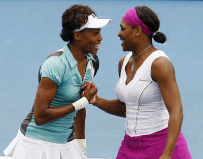 
Venus, left, and Serena Williams have extra motivation at Wimbledon after early exits at the French Open. Associated Press
 (Associated Press / The Spokesman-Review)
