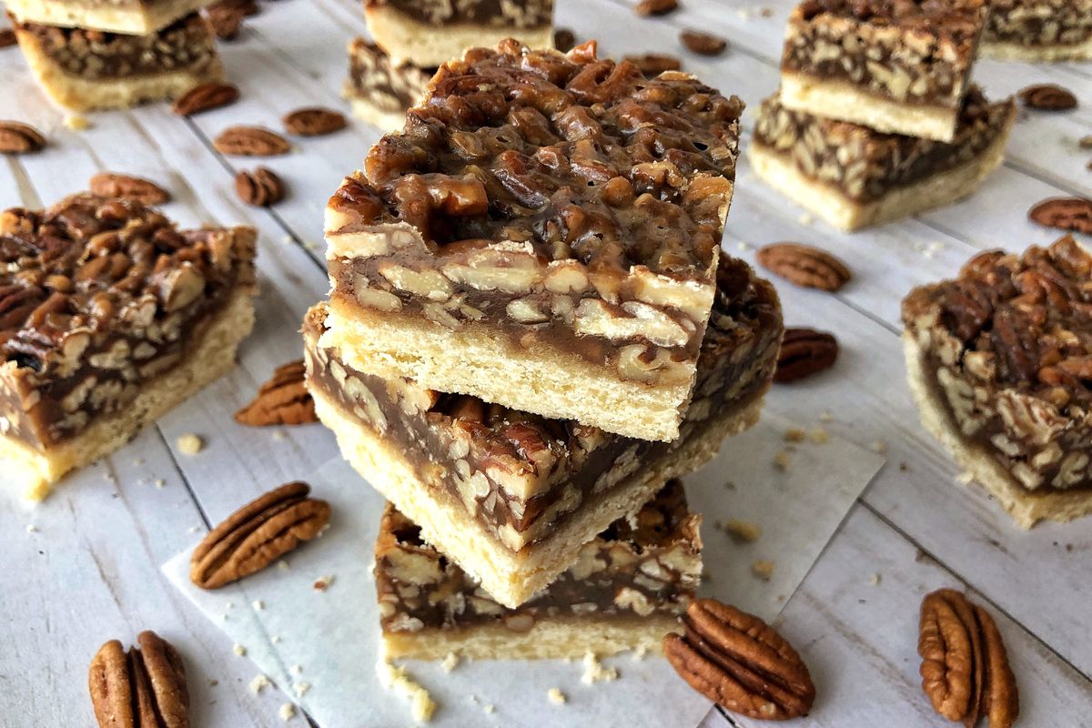 This recipe for pecan bars isn’t overly sweet, and it is fairly easy to make. (Audrey Alfaro / For The Spokesman-Review)