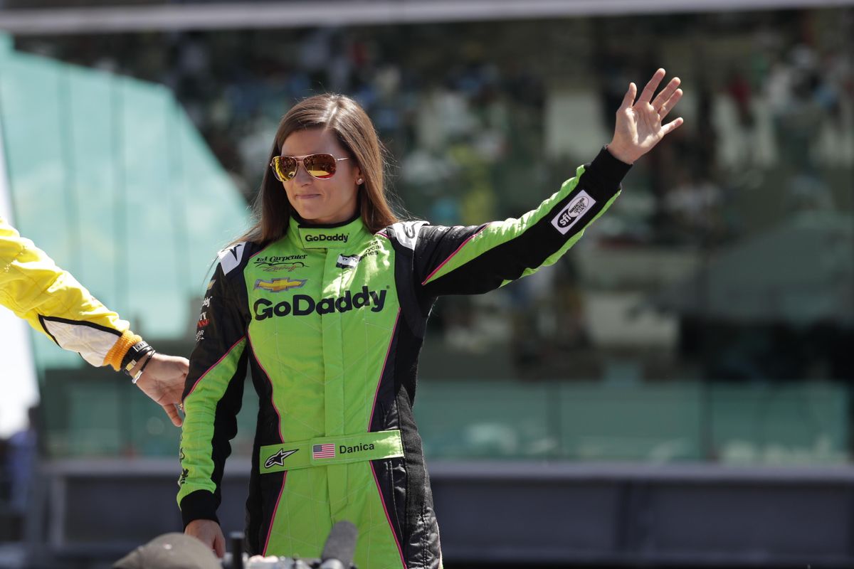 Danica Patrick waves before the start of the Indianapolis 500 auto race Sunday. (Michael Conroy / Associated Press)