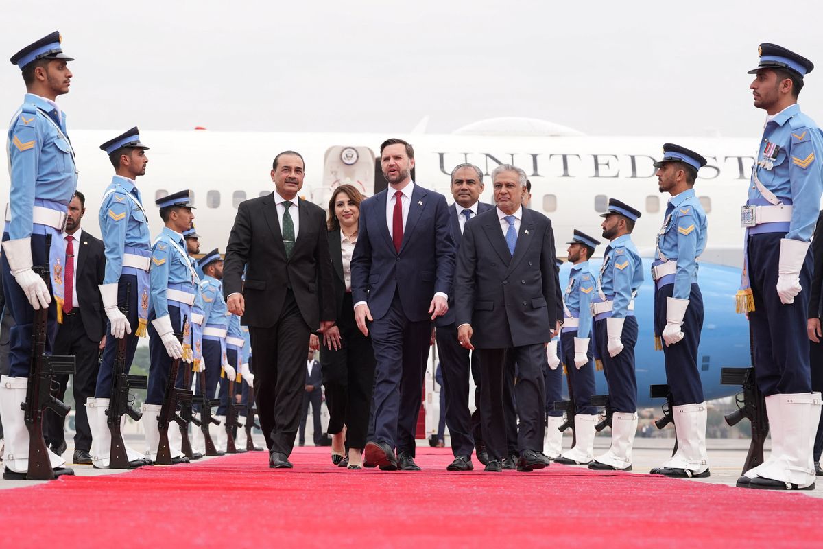 Vice President JD Vance, walks with Pakistani foreign affairs and defense officials after arriving for talks with Iranian officials Saturday in Islamabad.  (Reuters)