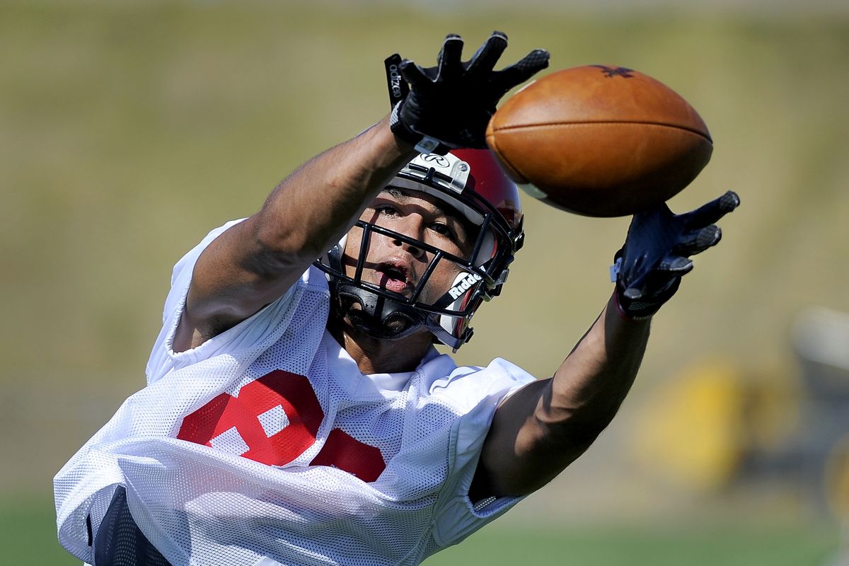 Eastern Washington wide reciever Jalani Phelps goes fully extended to make a catch during the first day of football practice on Thursday. (Colin Mulvany)
