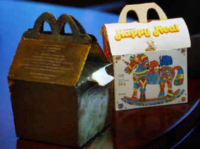 
An original Happy Meal box sits next to a bronze award given to Bob Bernstein.
 (Associated Press / The Spokesman-Review)