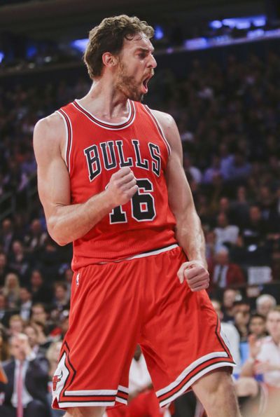 Pau Gasol, 21 points Wednesday, celebrates as his visiting Bulls spoil Derek Fisher’s debut as Knicks’ head coach in 104-80 rout. (Associated Press)