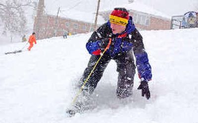 
A teen snowboards down a hill in Waynesboro, Va., on Monday. 
 (Associated Press / The Spokesman-Review)