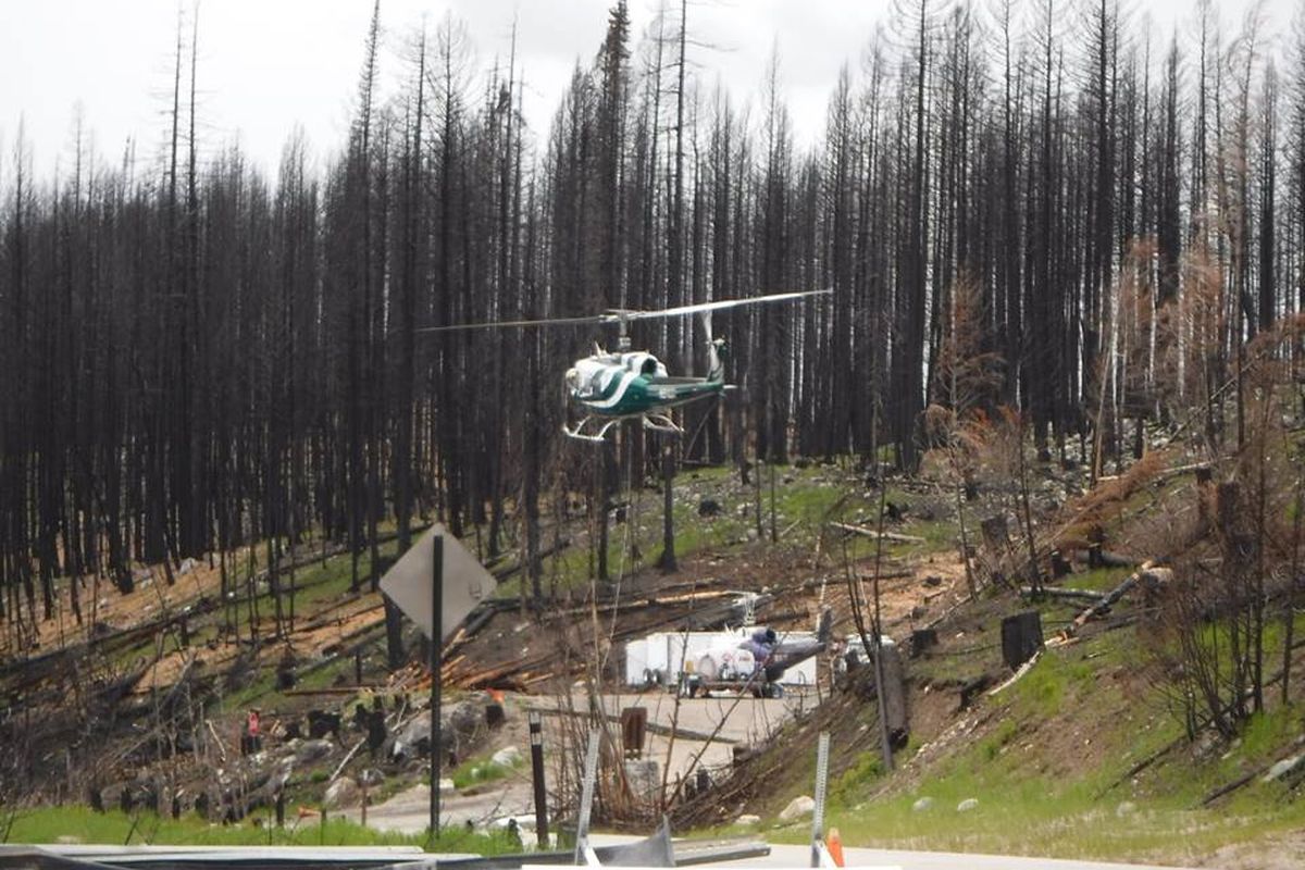 Helicopter crews drop straw and seed to help check erosion in the wake of the 2015 wildfires in the Colville National Forest. (Holly Weiler)