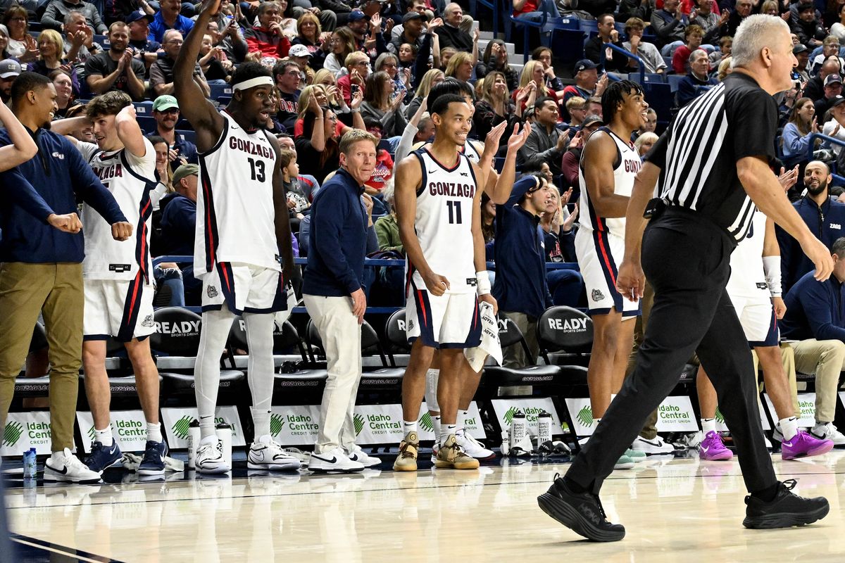 The Gonzaga bench reacts to a dunk by Gonzaga Khalif Battle (99) late the second half of a college basketball game with Warner Pacific, Wed. Oct. 30, 2024, at the McCarthey Athletic Center.  (Colin Mulvany / The Spokesman-Review)