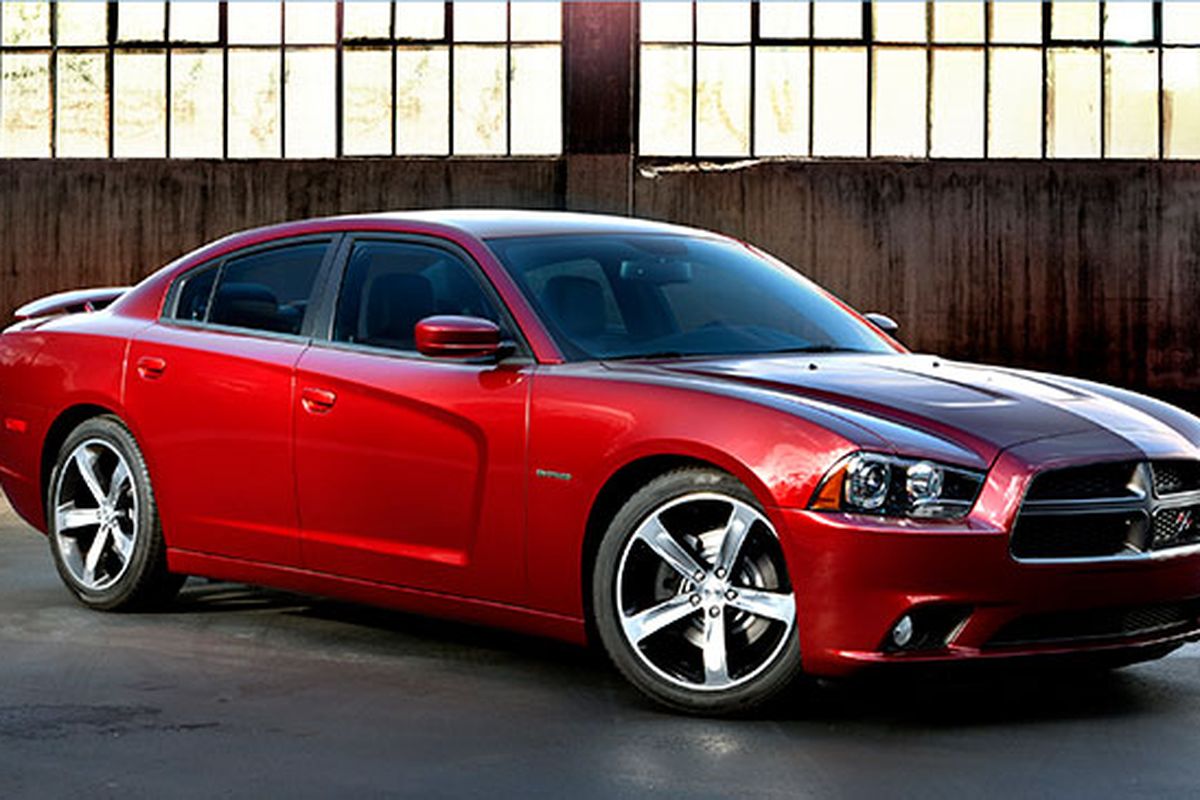 The Charger’s  waspish waist and muscular flanks carry more than a hint of the Viper’s menace. Its powerful and protuberant grill is as blatant as a Mac truck’s. (Dodge)