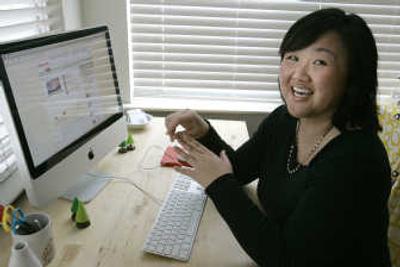 
Beckie Tran gets shopping ideas online from her network of friends on Kaboodle.com at her home in Santa Clara, Calif. Social shopping sites such as Kaboodle, ThisNext, Wishpot and StyleHive allow shoppers to view each other's wish lists, chat about online products and make recommendations. The sites don't sell anything, but users are encouraged to share links to good buys, bad deals or products that are just plain interesting. Associated Press
 (Associated Press / The Spokesman-Review)
