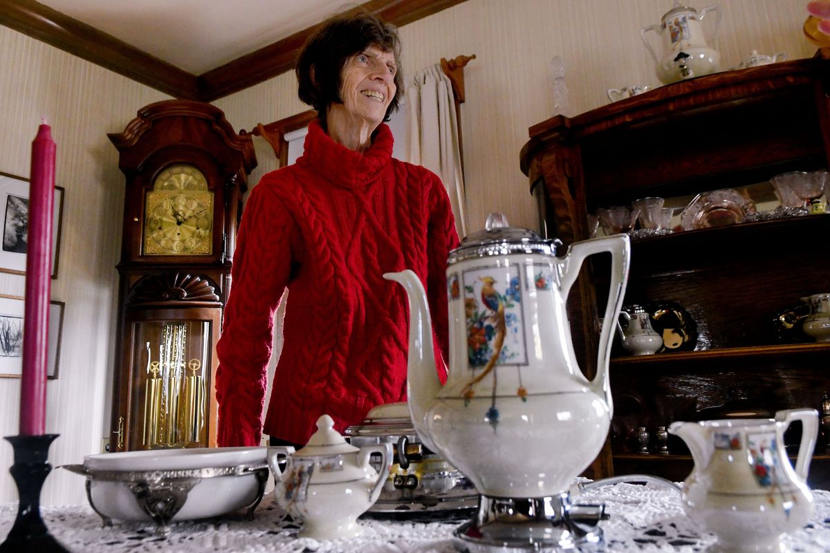 Bernadette Powers talks about her Fraunfelter Bird of Paradise china collection at her home in Spokane on April 12.  (Kathy Plonka/The Spokesman-Review)