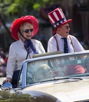 Larry and Sharon Stroebel enjoy the 2017 Coeur d'Alene Fourth of July Parade from an unusual vantage point, as this year's grand marshals. (Loren Benoit/Coeur d'Alene Press photo)