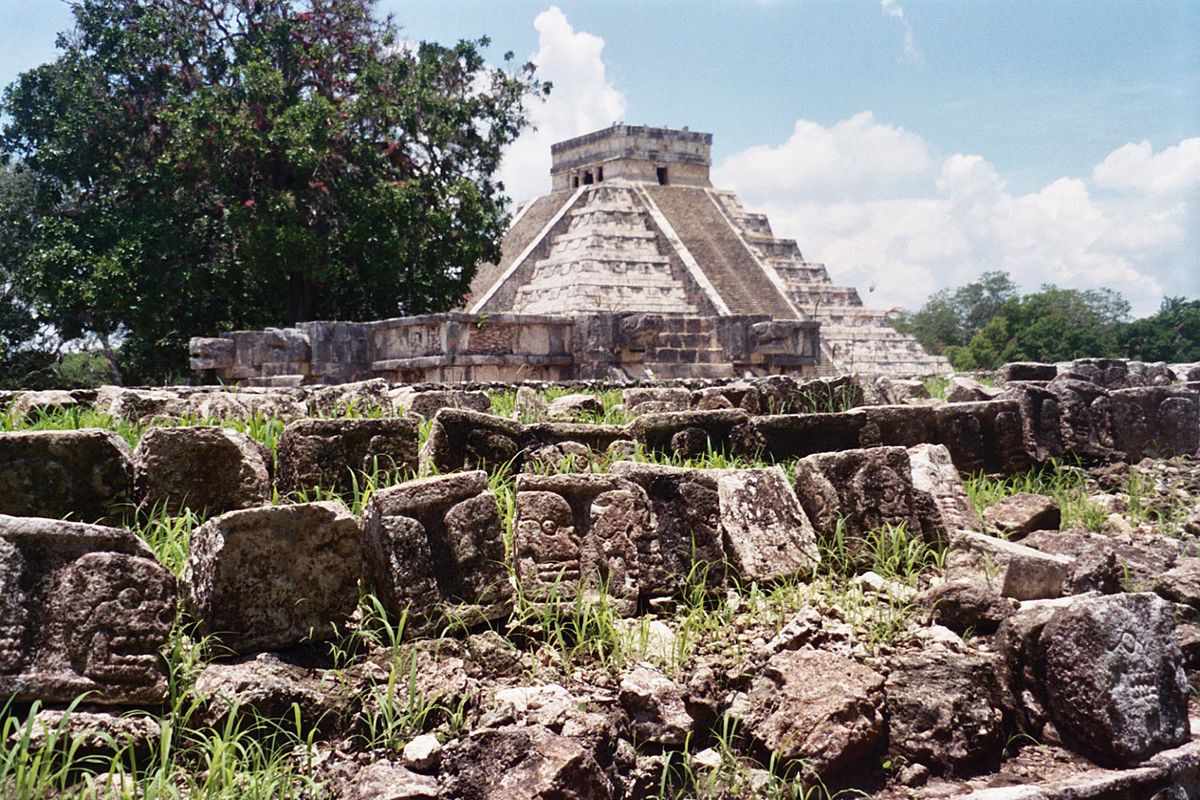 Left: A frieze of skulls adorns the side of the tzompantli, the platform probably used to exhibit sacrificed prisoners at the ancient Maya city of Chichen Itza, with the main pyramid, El Castillo, in the background. (The Spokesman-Review)