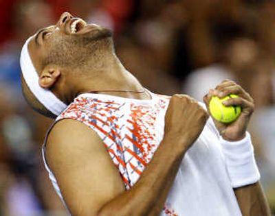 
James Blake of the United States celebrates after beating Sebastien Grosjean of France in a third-round match.  Associated Press
 (Associated Press / The Spokesman-Review)