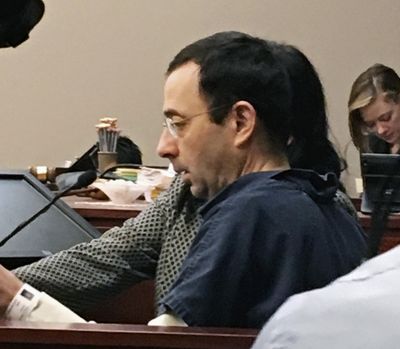 Former Michigan sports doctor Larry Nassar sits in court Tuesday, Jan. 16, 2018, in Lansing, Mich., at the start of his four-day sentencing hearing for sexually assaulting young gymnasts. (David Eggert / Associated Press)