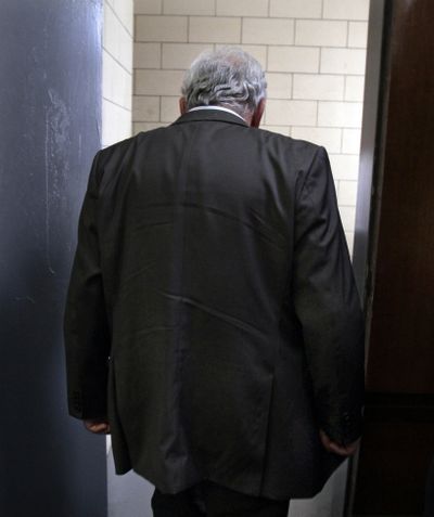 Dominique Strauss-Kahn leaves court and returns to jail after his bail hearing Thursday in New York state Supreme Court. (Associated Press)