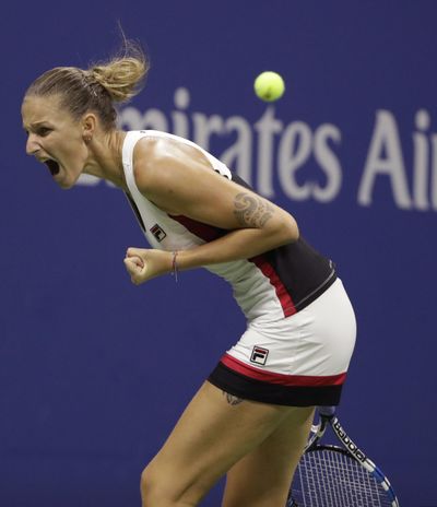 Karolina Pliskova reacts after breaking Serena Williams' serve. (Darron Cummings / Associated Press)