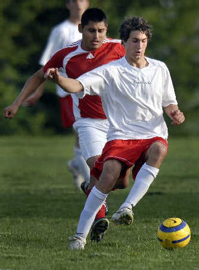 
Cheney High School's Adam Zakrzewski shows some fancy footwork against Prosser High School on  May 15 in Cheney. 
 (Jed Conklin / The Spokesman-Review)