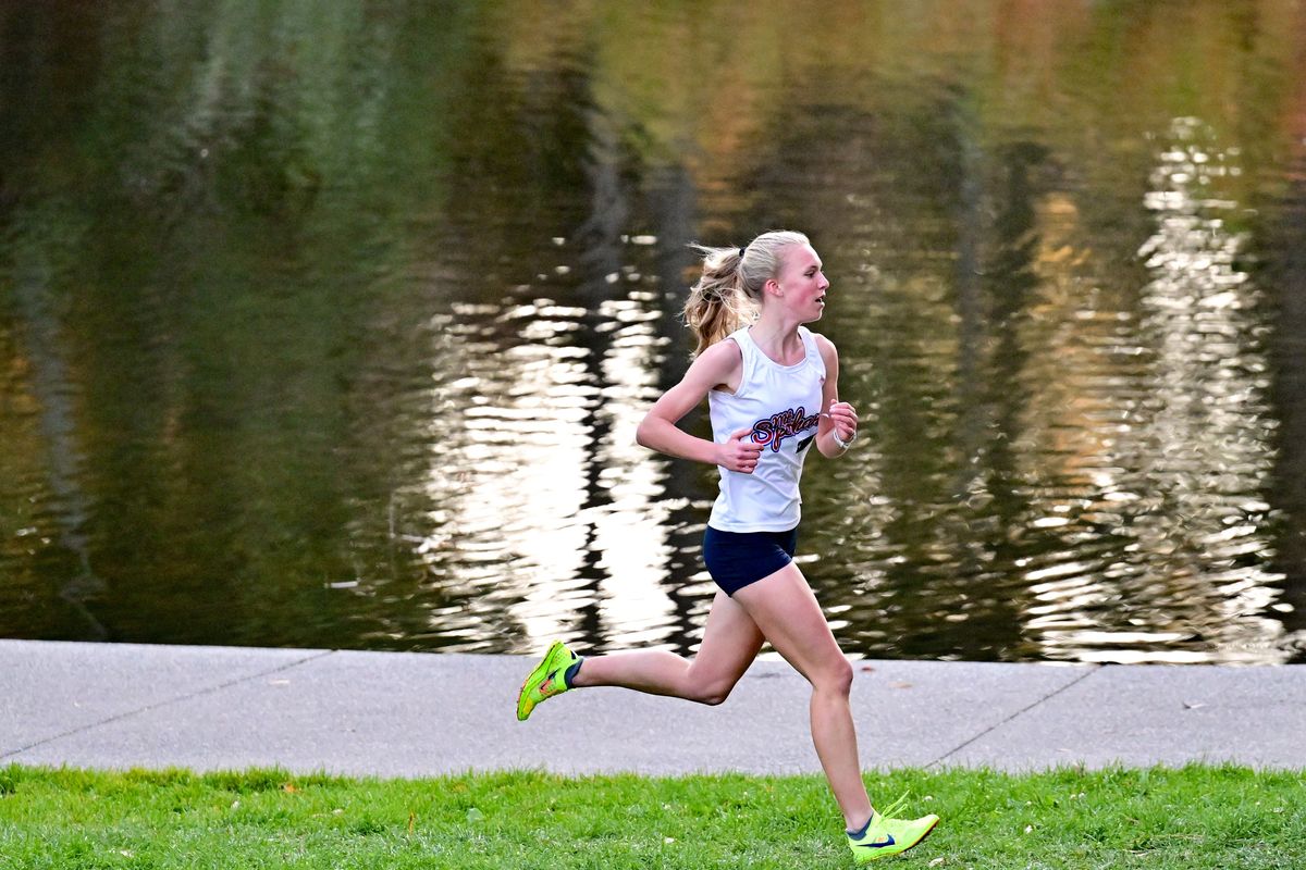 Mt. Spokane cross country runner Jane Wycoff seperates herself from the pack early during a high school cross country meet on Tuesday, Oct. 22, 2024, at Manito Park in Spokane, Wash. Wycoff won the 5k race with a time of 20:01.  (Tyler Tjomsland/The Spokesman-Review)