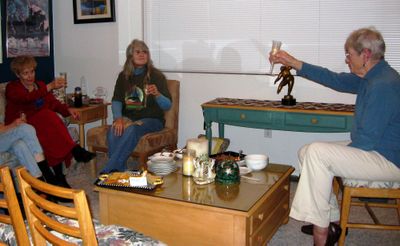 From right, Harriett Jacobson, Judy Janes and Joyce Tucker offer a toast to President Barack Obama at an inauguration party Jacobson hosted at her Spokane Valley home. (Photo by Sandra Babcock / The Spokesman-Review)