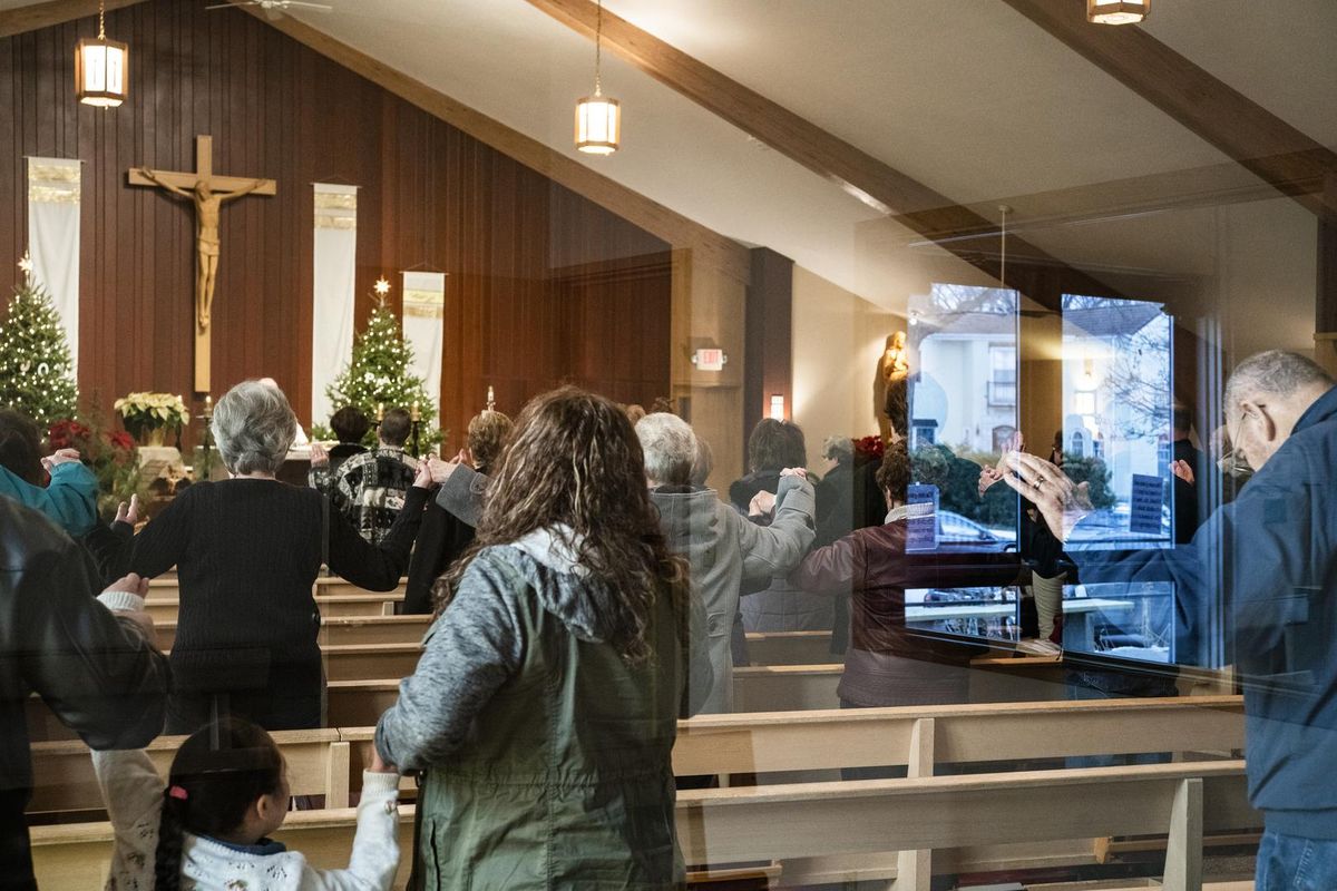 At the St. Joseph Parish in Barron, Minn., on Sunday, parishioners dedicate prayers to Jayme Closs, her friends, family, and all those who helped search for her. (Richard Tsong-Taatarii / Associated Press)