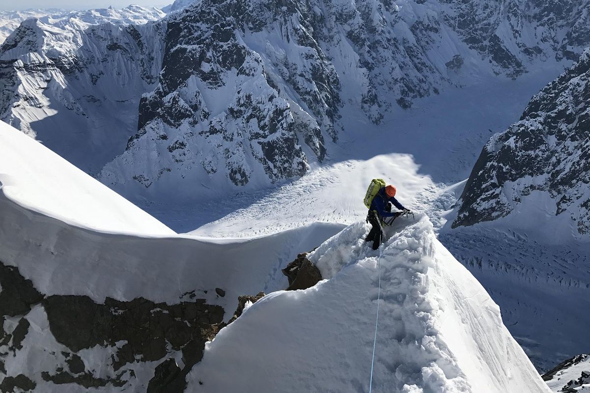 Clint Helander ascends the second in a series of peaks during the five-day first ascent of the Gauntlet Ridge Route on Alaska’s Mount Huntington with partner Jess Roskelley. (JESS ROSKELLEY PHOTO)