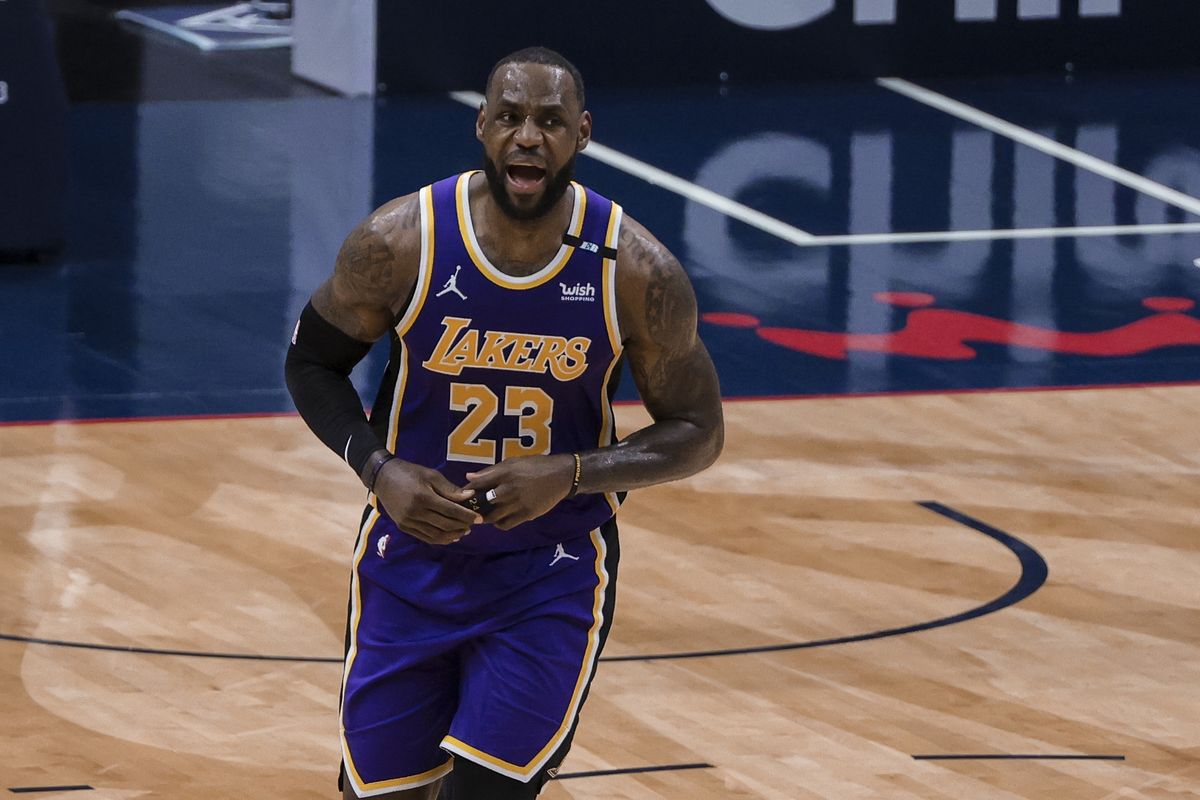 Los Angeles Lakers forward LeBron James (23) celebrates after scoring against the New Orleans Pelicans in the third quarter of an NBA basketball game in New Orleans, Sunday, May 16, 2021.  (Derick Hingle)