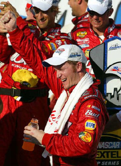 
Dale Earnhardt Jr., celebrates his first NASCAR victory of the season.
 (Associated Press / The Spokesman-Review)