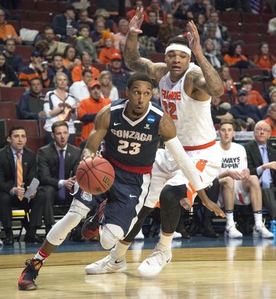 Eric McClellan’s absence in second half of Syracuse game left a reader to ponder why. (Dan Pelle / The Spokesman-Review)