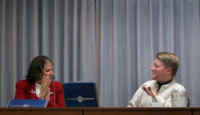 
Spokane Valley Mayor Diana Wilhite, left, and former Mayor Mike DeVleming share a light moment during the Nov. 16, 2004 City Council meeting, where Wilhite was chosen to replace DeVleming. 
 (Liz Kishimoto / The Spokesman-Review)