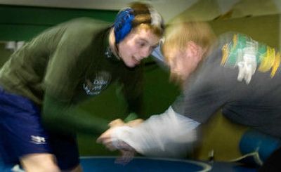 
Jon Millard, left, wrestles with fellow Lakeside (Nine Mile Falls) senior teammate Levi Jones. They are both making their fourth consecutive state appearances. 
 (Christopher Anderson / The Spokesman-Review)