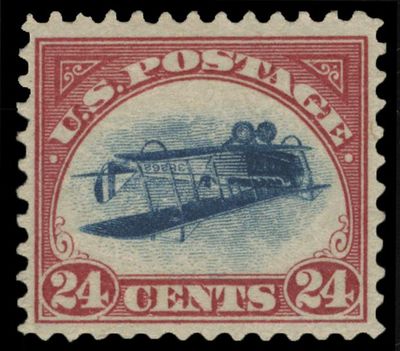 This undated photo provided by Spink, USA, shows a 1918 “inverted Jenny” stamp. Stolen in 1955, the stamp surfaced last week at Spink USA, a New York auction house. (Associated Press)