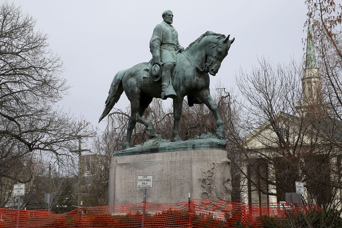 The statue of Robert E. Lee is seen uncovered in Emancipation Park in Charlottesville, Va., on Wednesday, Feb. 28, 2018. Charlottesville said in a news release Friday, July 9, 2021, that the equestrian statue of Confederate Gen. Robert E. Lee as well as a nearby one of Confederate Gen. Thomas “Stonewall” Jackson will be taken down Saturday.  (Zack Wajsgras)