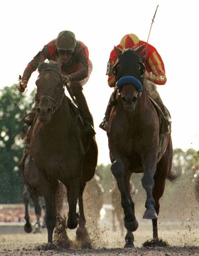 Victory Gallop, left, and Gary Stevens nosed out Real Quiet and Kent Desormeaux in 1998 Belmont. (Associated Press)