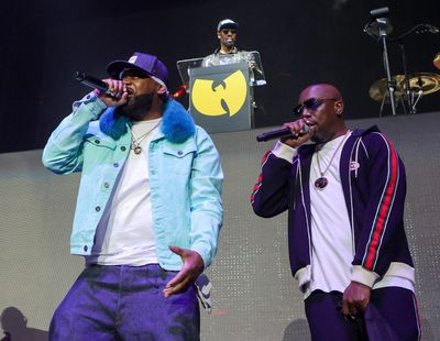 RZA, top, Ghostface Killah, left, and Inspectah Deck of Wu-Tang Clan perform during a stop of the N.Y. State of Mind tour at MGM Grand Garden Arena on Oct. 21, 2023, in Las Vegas. (Ethan Miller/Getty Images/TNS)  (Ethan Miller/Getty Images North America/TNS)