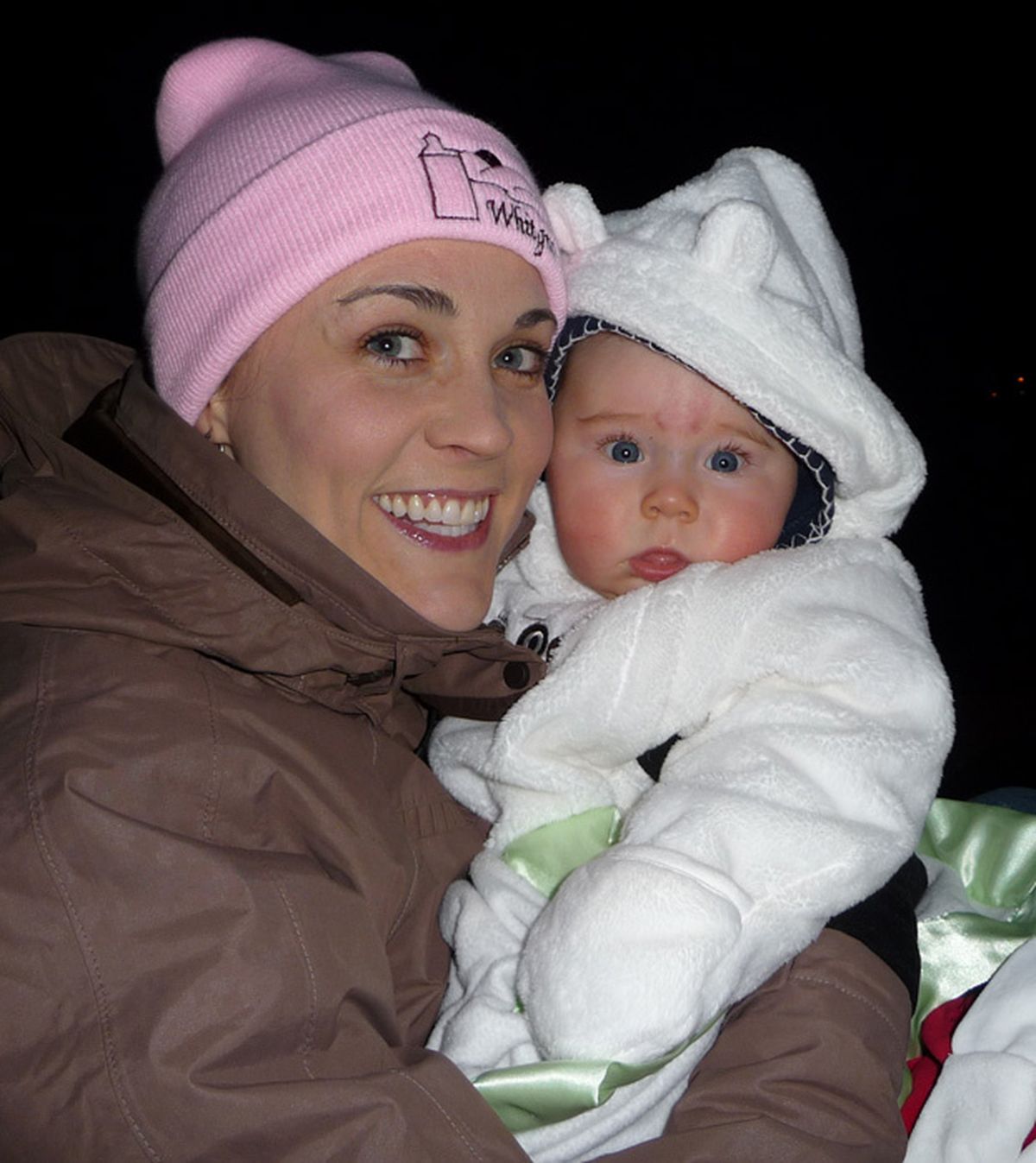 Now: Andee Schmick Thurston and 7-month-old daughter Kyla Jean enjoy a winter moment in Dayton.