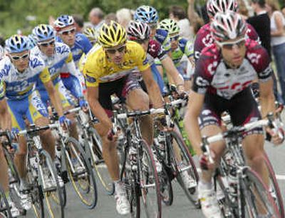 
The flat course helped Switzerland's Fabian Cancellara, center, maintain the overall lead at the 94th Tour de France. Associated Press
 (Associated Press / The Spokesman-Review)