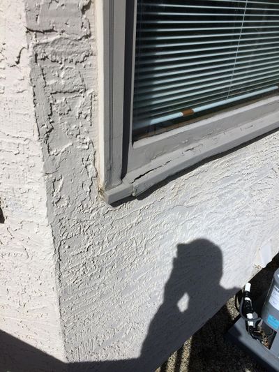 There are two reasons why this wood window sill is rotting. First and foremost there’s no roof overhang. The second reason is low-quality hybridized lumber was used to build the window sill. (Tim Carter)