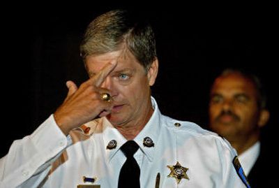 
Franklin County Sheriff Gary Toelke explains Tuesday how a woman rubbed makeup off the forehead of abducted baby Abby Woods, exposing her birthmark. 
 (Associated Press / The Spokesman-Review)
