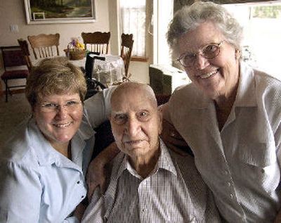 
From left, George Cunliffe's granddaughter, Gloria Linerud, George Cunliffe and Cunliffe's daughter, Donna Haycock, represent three generations of the Cunliffe family. 
 (Liz Kishimoto / The Spokesman-Review)