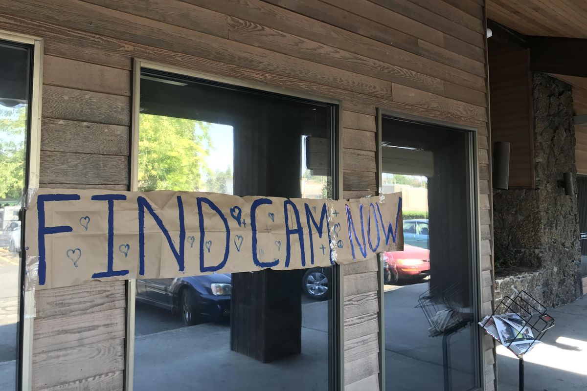 Employees were greeted by this sign when they came into work Monday morning. It was apparently put up by friends of Cameron Smith, who was kidnapped while on his lunch break at Lucid Marijuana Sunday, Sept. 10, 2017. (Jonathan Glover / The Spokesman-Review)
