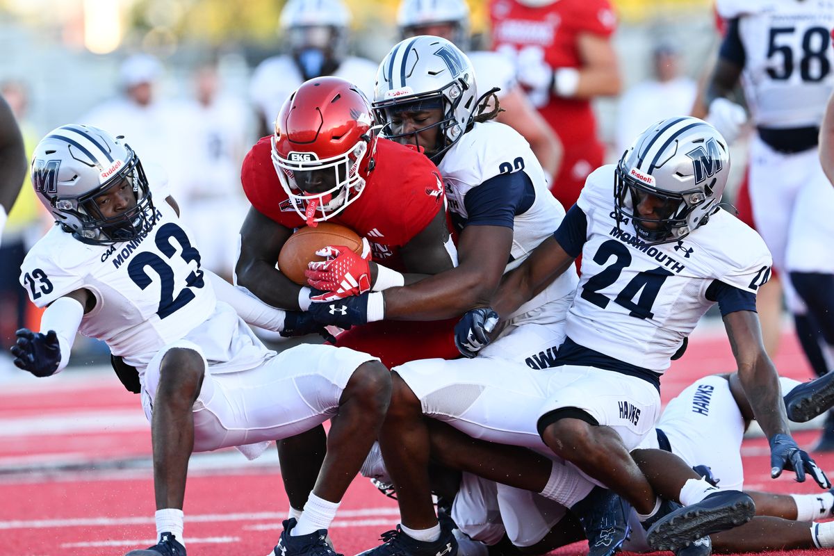 Eastern Washington Eagles running back Tuna Altahir (5) crashes through the Monmouth defense during the first half of a college football game on Thursday, Aug. 29, 2024, at Roos Field in Cheney, Wash.  (Tyler Tjomsland/The Spokesman-Review)