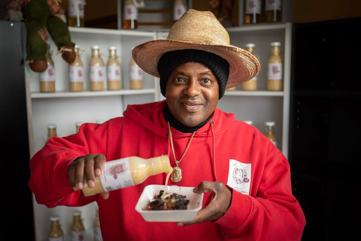 Douglas Williams grew up in Alabama where his mother opened a restaurant in 1998. After moving to Spokane in 2015, his friends urged him to bottle his mom’s white barbecue sauce. With some help from a WSU professor, he’s started the business. His BBQ sauce is now sold in about a dozen stores in the Spokane/Coeur d’Alene area.  (COLIN MULVANY/THE SPOKESMAN-REVIEW)